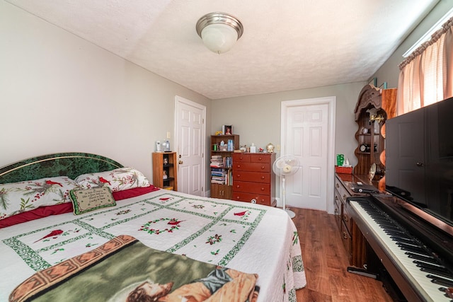 83 2nd St, Shelby, OH 44875 - bedroom with wood finished floors