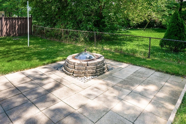 2197 Bayfield Dr, Columbus, OH 43229 - view of patio featuring an outdoor fire pit