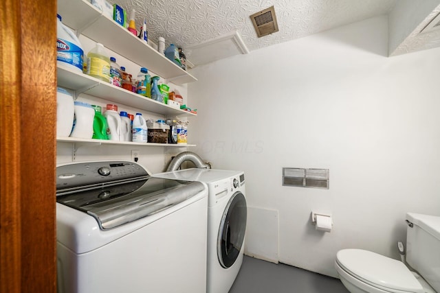 2197 Bayfield Dr, Columbus, OH 43229 - washroom featuring washing machine and clothes dryer and attic access