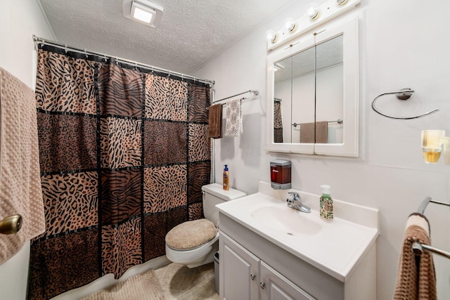 2197 Bayfield Dr, Columbus, OH 43229 - full bathroom with vanity, curtained shower, and a textured ceiling