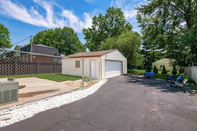 2197 Bayfield Dr, Columbus, OH 43229 - detached garage featuring asphalt driveway