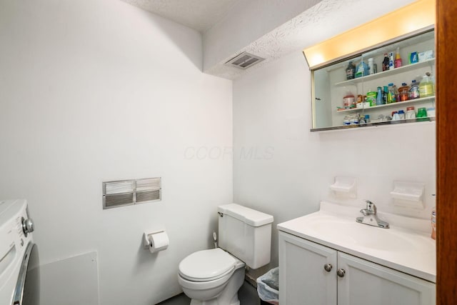 2197 Bayfield Dr, Columbus, OH 43229 - half bathroom with washer and dryer and vanity
