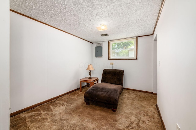 2197 Bayfield Dr, Columbus, OH 43229 - living area featuring carpet flooring, crown molding, electric panel, and a textured ceiling