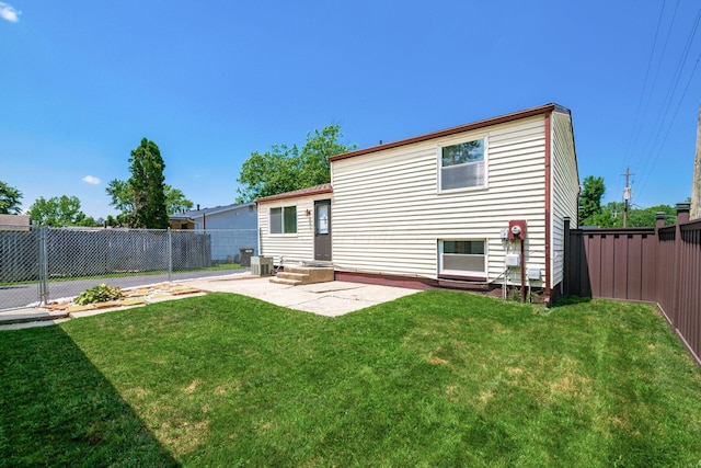 2197 Bayfield Dr, Columbus, OH 43229 - rear view of house featuring a fenced backyard and a patio