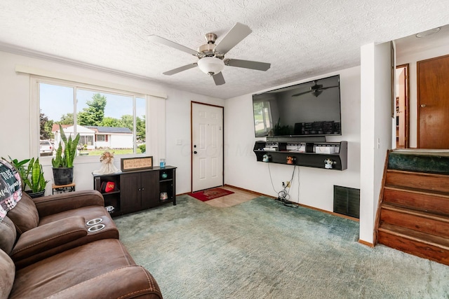 2197 Bayfield Dr, Columbus, OH 43229 - living area featuring carpet flooring, a ceiling fan, and a textured ceiling