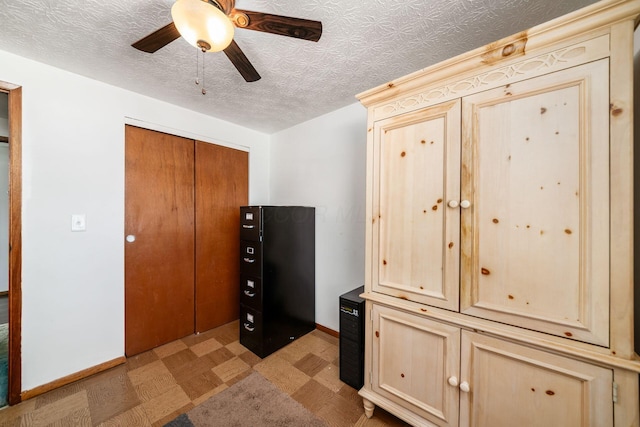 2197 Bayfield Dr, Columbus, OH 43229 - interior space featuring light flooring, ceiling fan, and a textured ceiling