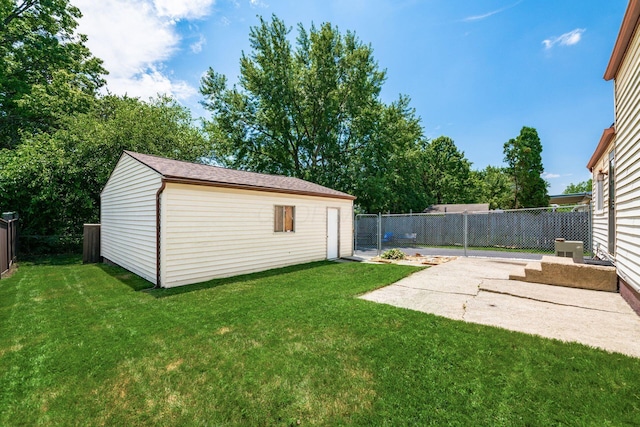 2197 Bayfield Dr, Columbus, OH 43229 - fenced backyard featuring an outbuilding and a patio