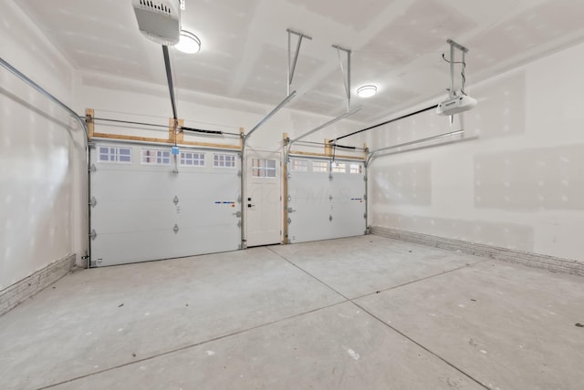 583 E Walnut St, Columbus, OH 43215 - garage featuring a garage door opener