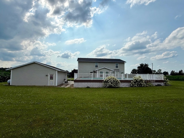 3701 Swisher Rd, Crestline, OH 44827 - back of property featuring a wooden deck and a yard