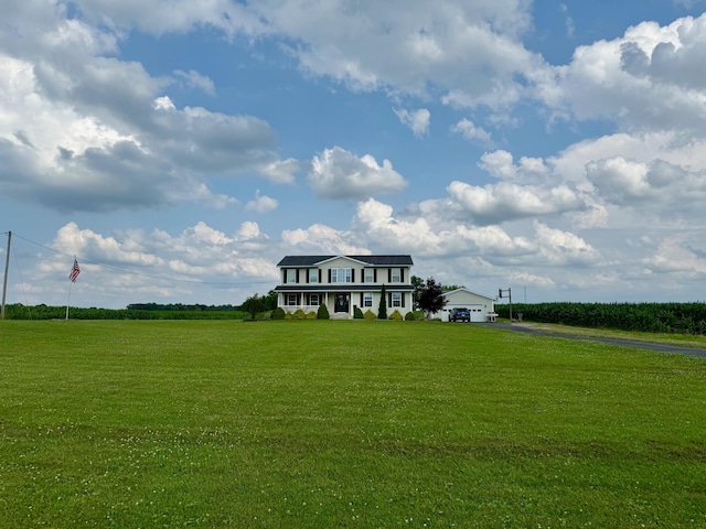 3701 Swisher Rd, Crestline, OH 44827 - view of front of property with a front lawn, a detached garage, and a rural view