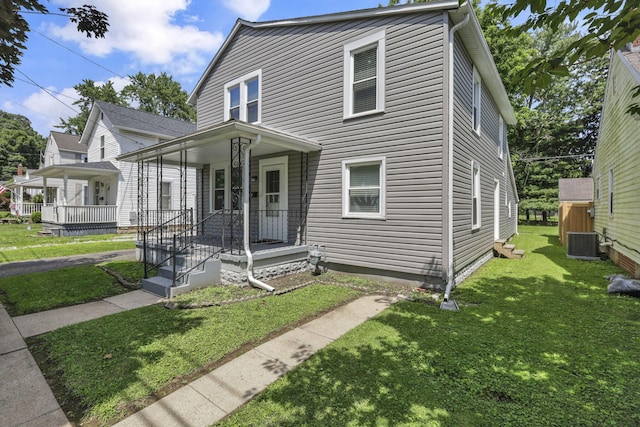 716 N Mount Pleasant Ave, Lancaster, OH 43130 - view of front of house with a front yard and covered porch