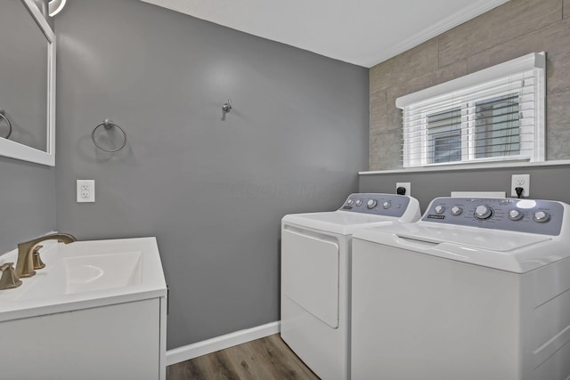 716 N Mount Pleasant Ave, Lancaster, OH 43130 - washroom featuring washer and dryer and dark wood-type flooring