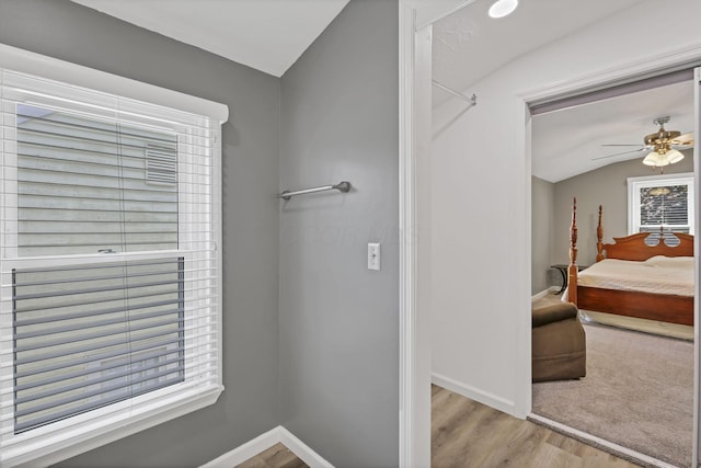 716 N Mount Pleasant Ave, Lancaster, OH 43130 - bathroom with wood finished floors, a ceiling fan, and vaulted ceiling