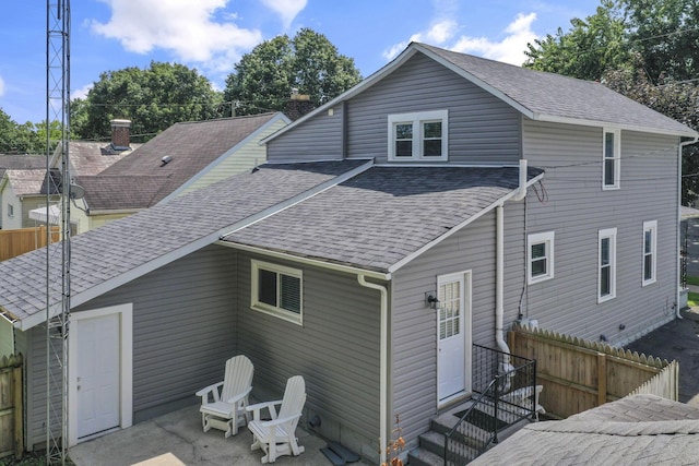 716 N Mount Pleasant Ave, Lancaster, OH 43130 - back of house featuring a shingled roof and a patio area