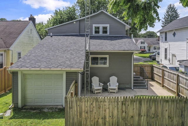 716 N Mount Pleasant Ave, Lancaster, OH 43130 - rear view of property with a shingled roof and a patio