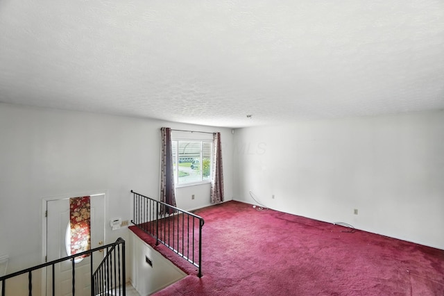617 Athens St, Columbus, OH 43204 - spare room with carpet floors and a textured ceiling