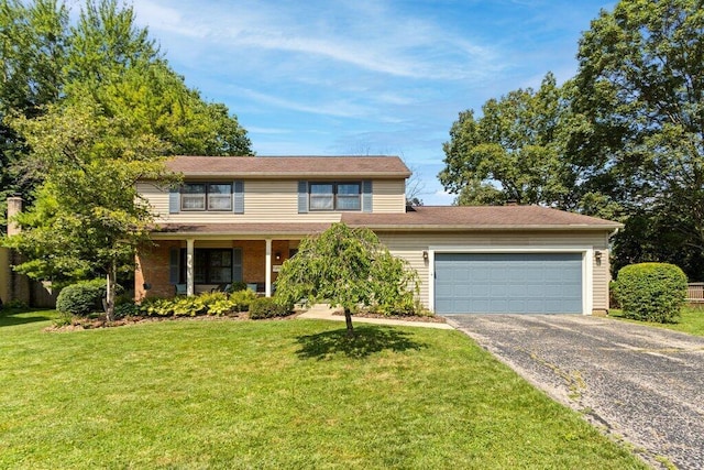 7107 Stone Ct, Columbus, OH 43235 - traditional home featuring driveway, a garage, a front lawn, and a porch