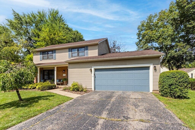 7107 Stone Ct, Columbus, OH 43235 - traditional-style home featuring driveway, an attached garage, a front yard, and covered porch