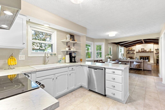 7107 Stone Ct, Columbus, OH 43235 - kitchen with dishwasher, a peninsula, open shelves, light tile patterned floors, and white cabinetry