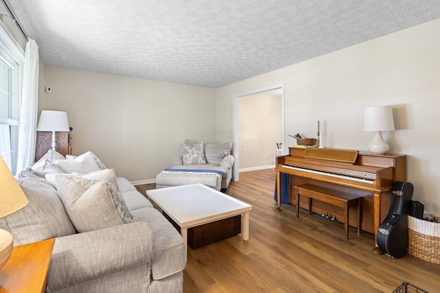 7107 Stone Ct, Columbus, OH 43235 - living room with wood finished floors and a textured ceiling