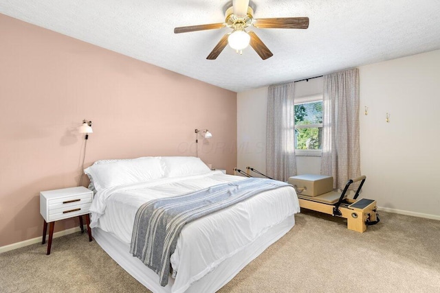 7107 Stone Ct, Columbus, OH 43235 - bedroom featuring light carpet, a textured ceiling, and a ceiling fan