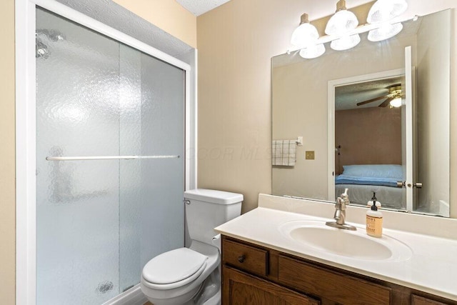 7107 Stone Ct, Columbus, OH 43235 - ensuite bathroom featuring a stall shower, vanity, and ceiling fan
