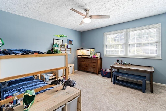 7107 Stone Ct, Columbus, OH 43235 - carpeted bedroom with a textured ceiling and ceiling fan