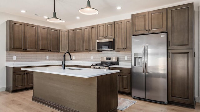 58 Lippert Ln, Buckeye Lake, OH 43008 - kitchen featuring appliances with stainless steel finishes, light wood-style flooring, light countertops, and recessed lighting
