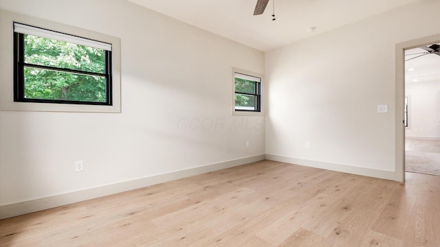 58 Lippert Ln, Buckeye Lake, OH 43008 - empty room featuring a ceiling fan, healthy amount of natural light, and light wood finished floors