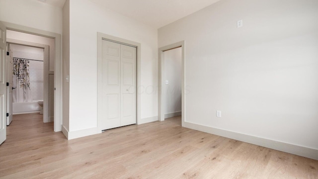 58 Lippert Ln, Buckeye Lake, OH 43008 - unfurnished bedroom with light wood finished floors and a closet