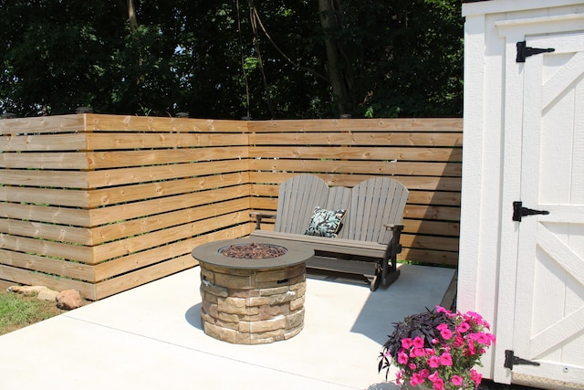 58 Lippert Ln, Buckeye Lake, OH 43008 - view of patio featuring a fire pit