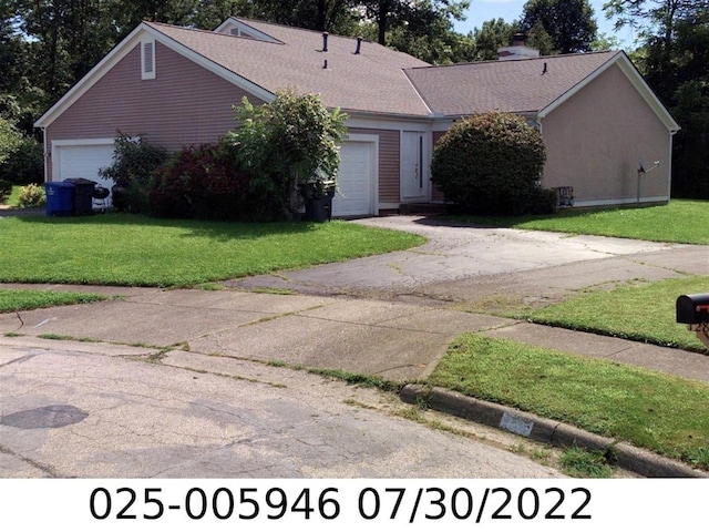 1290 Paddington Ct, Columbus, OH 43230 - single story home featuring an attached garage, a front yard, and driveway
