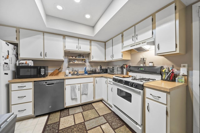 1290 Paddington Ct, Columbus, OH 43230 - kitchen featuring dishwasher, gas range gas stove, black microwave, under cabinet range hood, and white cabinetry