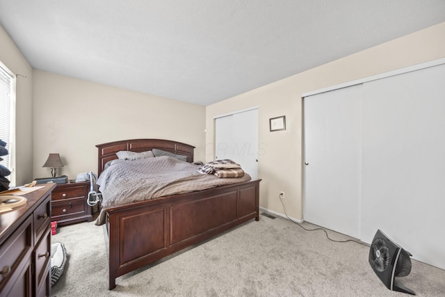 1290 Paddington Ct, Columbus, OH 43230 - bedroom featuring light colored carpet and multiple closets