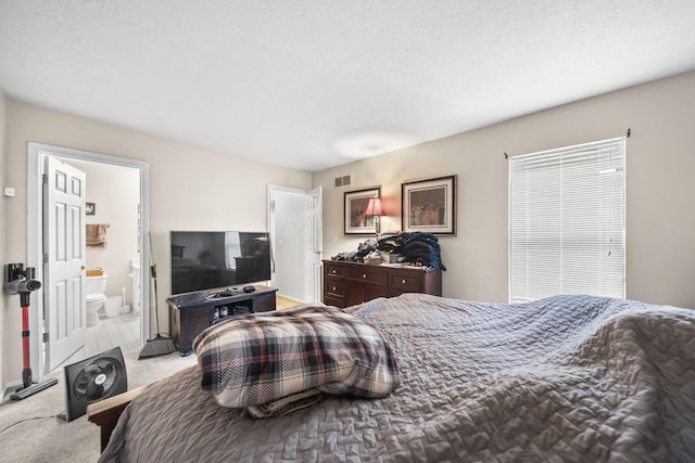 1290 Paddington Ct, Columbus, OH 43230 - bedroom featuring light colored carpet and ensuite bath