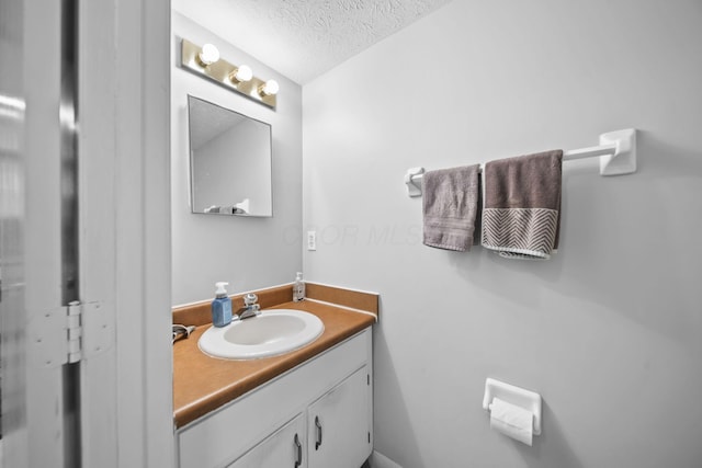 1290 Paddington Ct, Columbus, OH 43230 - bathroom with vanity and a textured ceiling