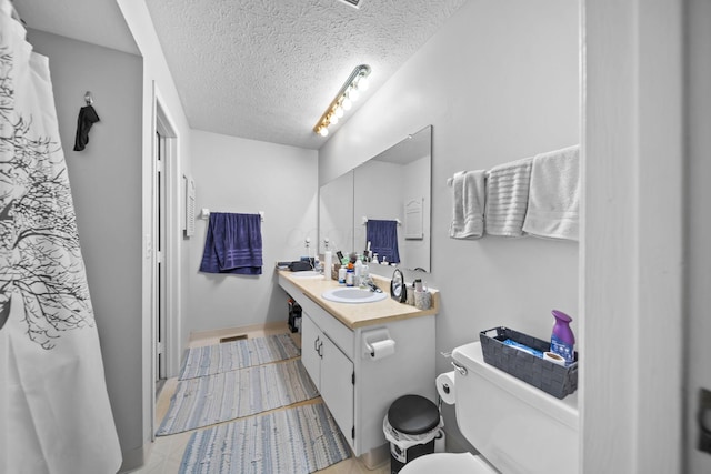 1290 Paddington Ct, Columbus, OH 43230 - bathroom with vanity and a textured ceiling