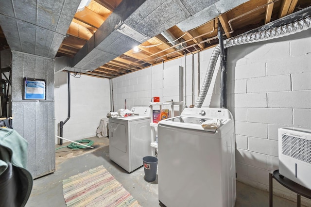 1290 Paddington Ct, Columbus, OH 43230 - unfinished below grade area with washing machine and dryer, heating unit, and concrete block wall