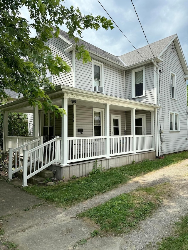 134 W Bomford St, Richwood, OH 43344 - view of front of house featuring a porch and roof with shingles