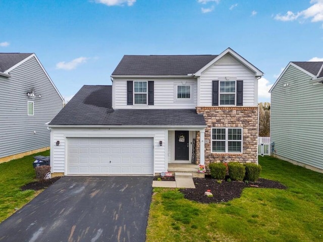 5582 Freedom Run, Orient, OH 43146 - traditional-style house featuring a front yard, driveway, stone siding, and a shingled roof