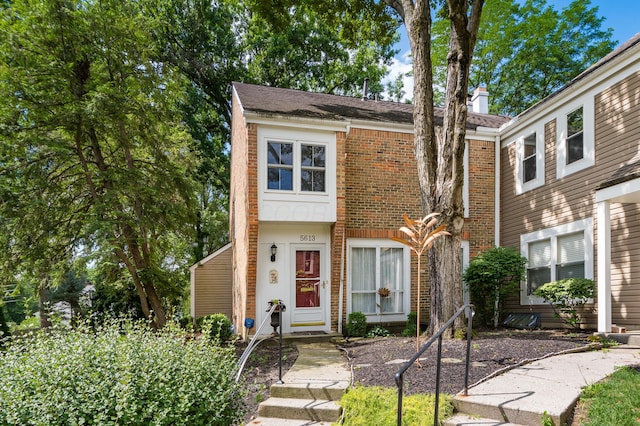 5613 Chowning Way, Columbus, OH 43213 - view of front of property featuring brick siding and a chimney