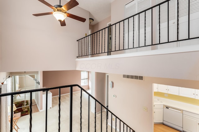 5613 Chowning Way, Columbus, OH 43213 - stairs featuring a high ceiling and a ceiling fan