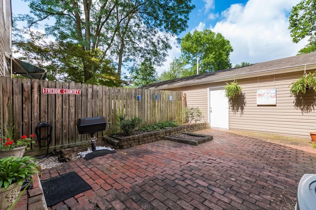 5613 Chowning Way, Columbus, OH 43213 - fenced backyard featuring a patio area and area for grilling