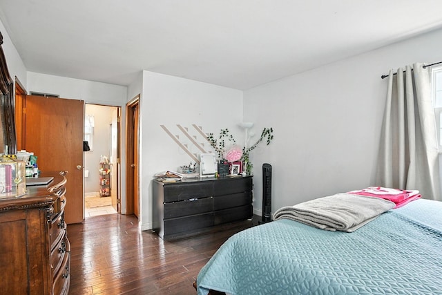 5328 Torchwood Loop E, Columbus, OH 43229 - bedroom featuring dark wood-style floors and connected bathroom