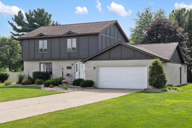 1242 Springbrook Dr, Mansfield, OH 44906 - view of front of property with board and batten siding, brick siding, a front lawn, and driveway