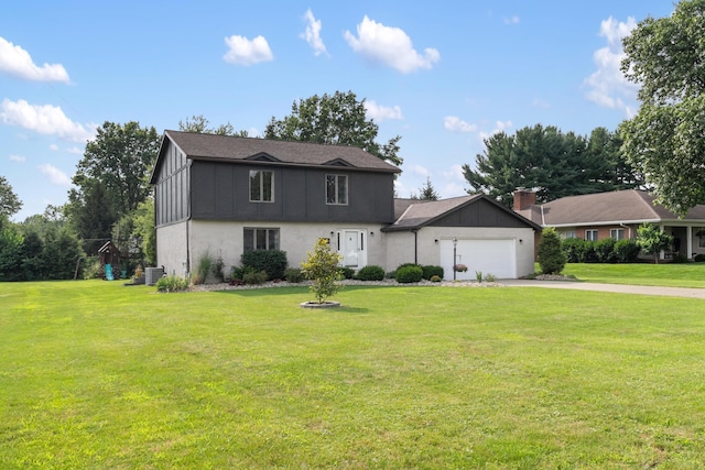1242 Springbrook Dr, Mansfield, OH 44906 - dutch colonial with a garage, driveway, and a front lawn