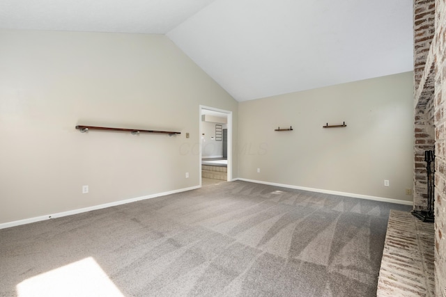 1242 Springbrook Dr, Mansfield, OH 44906 - unfurnished living room featuring lofted ceiling and carpet flooring