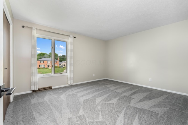 1242 Springbrook Dr, Mansfield, OH 44906 - carpeted spare room featuring baseboards