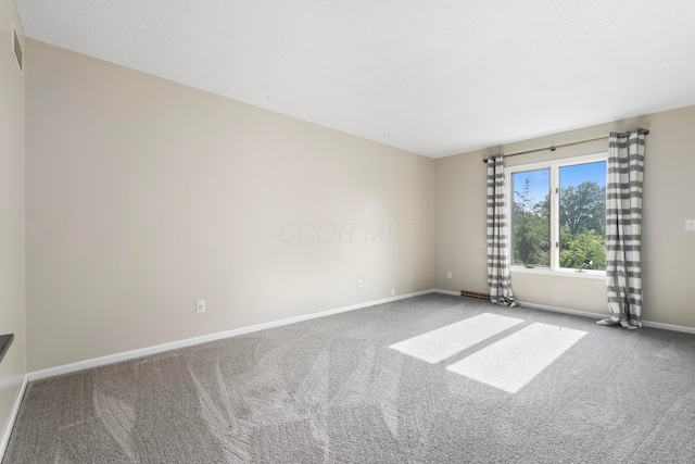 1242 Springbrook Dr, Mansfield, OH 44906 - spare room with carpet floors and baseboards