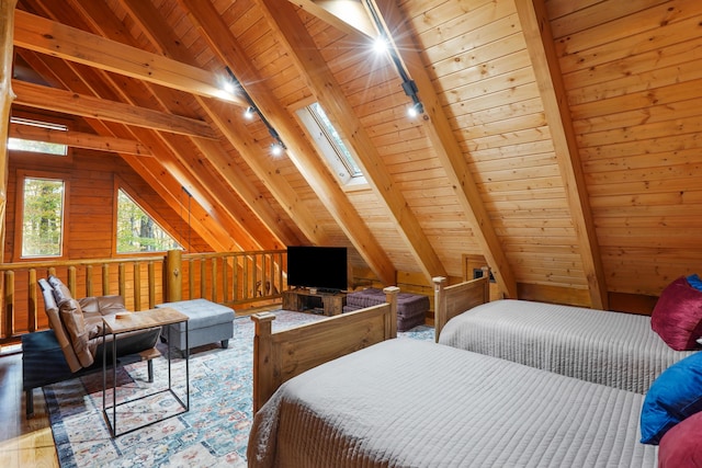 16651 Skinner Rd, Logan, OH 43138 - bedroom featuring wood ceiling, rail lighting, and wood walls